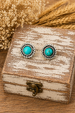 Load image into Gallery viewer, Turquoise stone earrings on a wooden box with dried flowers in the background