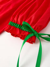 Load image into Gallery viewer, Red fabric with green ribbon on a white background