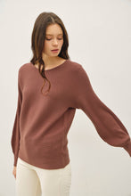 Load image into Gallery viewer, Woman wearing a brown ribbed sweater against a white background