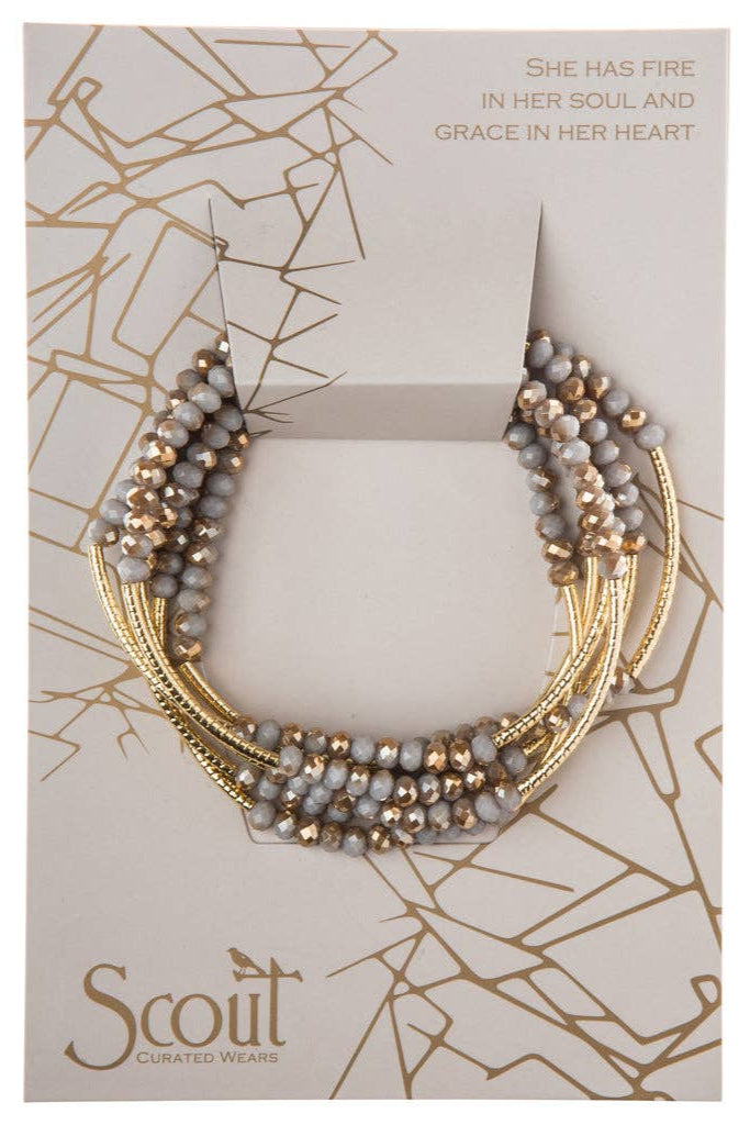 Necklace on a Scout branded card with decorative design