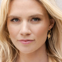 Load image into Gallery viewer, Close-up of a woman with blonde hair wearing gold earrings.
