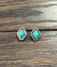 Load image into Gallery viewer, Pair of turquoise stone earrings on a wooden surface