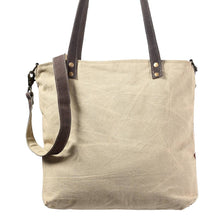 Load image into Gallery viewer, Beige tote bag with brown leather straps on a white background