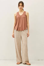 Load image into Gallery viewer, Woman wearing a brown sleeveless top and beige wide-leg pants on a white background
