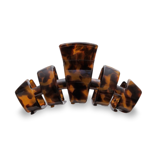 Tortoiseshell hair clip on a white background