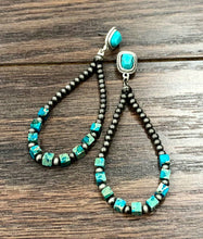 Load image into Gallery viewer, Pair of beaded earrings with turquoise stones on a wooden surface