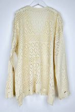 Load image into Gallery viewer, Cream-colored knitted sweater on a white background