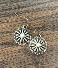 Load image into Gallery viewer, Silver floral earrings on a wooden surface