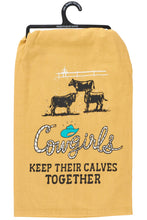 Load image into Gallery viewer, Yellow towel with cowgirl-themed design and text on a hanger