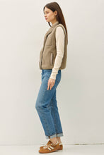 Load image into Gallery viewer, Woman wearing a beige vest, cream sweater, blue jeans, and brown shoes on a white background