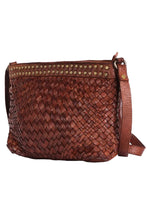 Load image into Gallery viewer, Brown woven handbag with studded details on a white background
