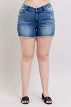 Load image into Gallery viewer, Person wearing blue denim shorts on a plain background
