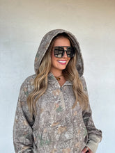 Load image into Gallery viewer, woman wearing camo top