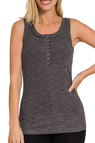 Woman wearing a charcoal ribbed tank top on a white background