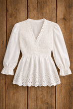 Load image into Gallery viewer, White blouse with long sleeves on a wooden background