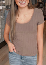 Load image into Gallery viewer, Woman wearing a brown ribbed top and blue jeans in a store setting