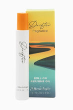 Load image into Gallery viewer, Roll-on perfume oil with packaging featuring 'Drifter' fragrance on a white background