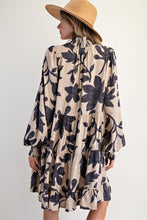 Load image into Gallery viewer, Woman wearing a floral dress and hat on a white background