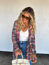 Load image into Gallery viewer, Woman wearing a plaid shirt, white top, and jeans with sunglasses against a white background