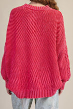 Load image into Gallery viewer, Person wearing a pink knitted sweater and light-colored pants with a beige bucket hat on a plain background