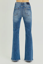 Load image into Gallery viewer, Blue jeans on a gray background