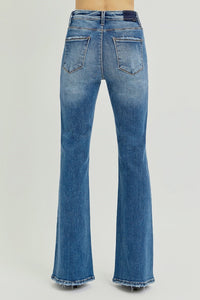 Blue jeans on a gray background