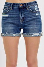 Load image into Gallery viewer, Blue denim shorts with distressed details on a white background
