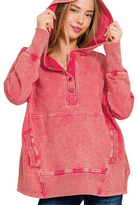 woman wearing pink hoodie