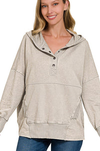 woman wearing light grey hoodie