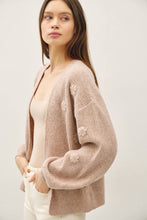 Load image into Gallery viewer, Woman wearing a beige cardigan against a plain background
