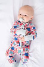 Load image into Gallery viewer, Baby wearing a red, white, and blue patterned onesie on a white background
