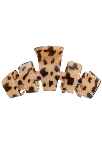 Tortoiseshell hair clip on a white background
