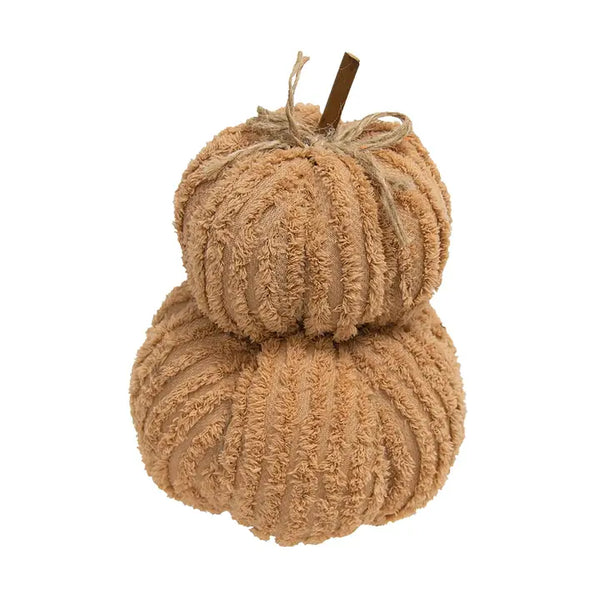 A decorative stacked pumpkin decoration made from chunky ribbed chenille yarn in a warm tan color, with a small brown stem and twine bow at the top, shown on a plain white background.
