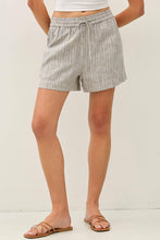 Load image into Gallery viewer, Person wearing striped shorts on a plain background