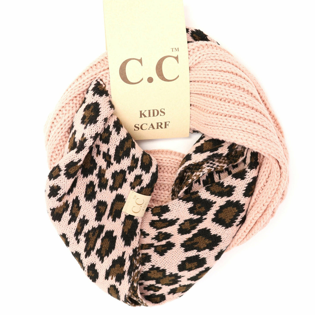 Pink scarf with leopard print pattern and C.C tag on a white background