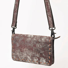 Load image into Gallery viewer, Brown leather crossbody bag with a textured surface on a white background