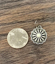 Load image into Gallery viewer, Silver floral earring next to a U.S. quarter on a wooden surface