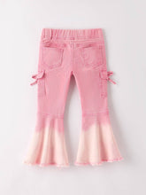 Load image into Gallery viewer, Pink flared jeans on a light gray background
