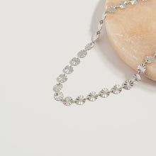 Load image into Gallery viewer, Silver necklace on a light background