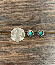 Load image into Gallery viewer, Pair of turquoise stone earrings on a wooden surface with a quarter for scale.