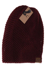 Load image into Gallery viewer, Maroon knitted beanie with a brand tag on a white background