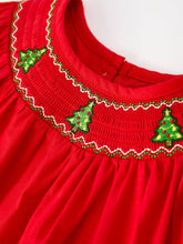 Load image into Gallery viewer, Red dress with green embroidered Christmas tree designs on a white background