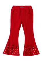 Load image into Gallery viewer, Red flared pants with decorative elements on a white background