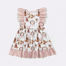 Load image into Gallery viewer, Children's dress with cowboy print and pink ruffles on a white background