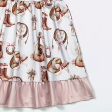 Load image into Gallery viewer, Skirt with cowboy boot, hat, and guitar pattern on a white background