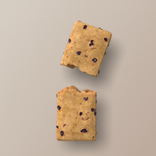 Load image into Gallery viewer, Two square cookies with chocolate chips on a beige background