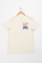 Load image into Gallery viewer, Beige t-shirt with graphic design on a white background