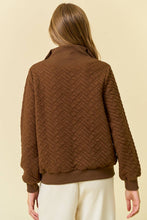 Load image into Gallery viewer, Brown textured jacket worn by a person on a beige background