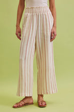 Load image into Gallery viewer, Person wearing striped pants on a solid background