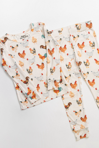 Set of pajama pants with chicken pattern on a white background